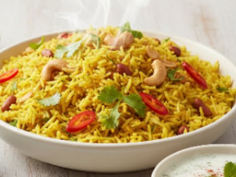 Kukuma Reis aus der Heißluftfritteuse - perfekt zubereitet mit goldgelber Farbe und aromatischen Gewürzen